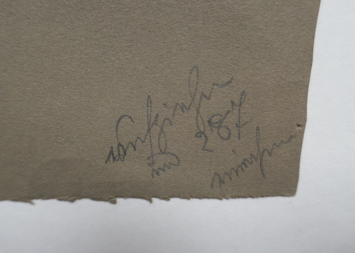 Notiz auf Blattrückseite