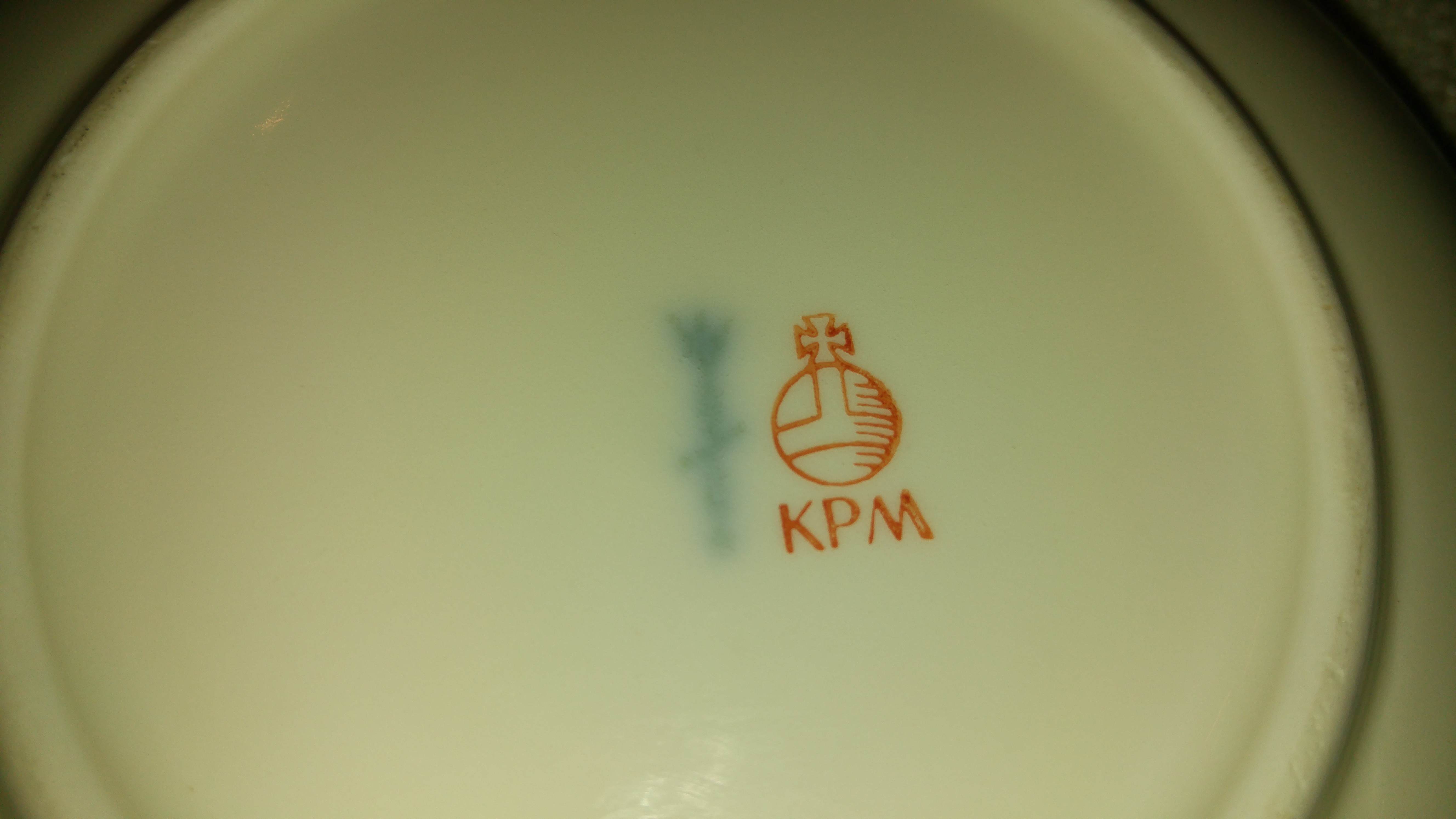 KPM und 2 Symbole