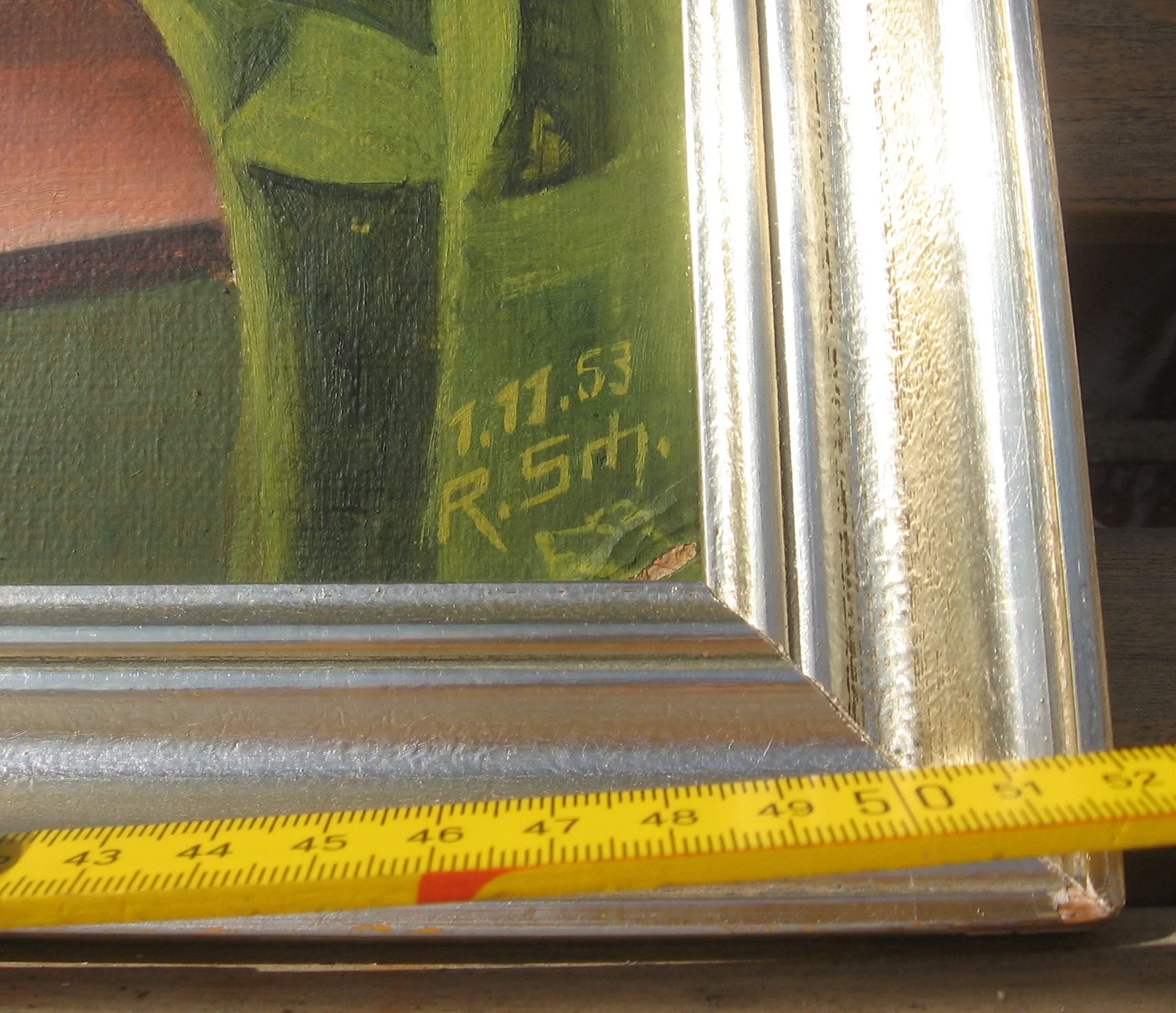 Eine kleine markante Auffälligkeit ist eine kleine Skizze unter der Signatur die vielleicht einen Hunde oder Mausekopf darstellen könnte.