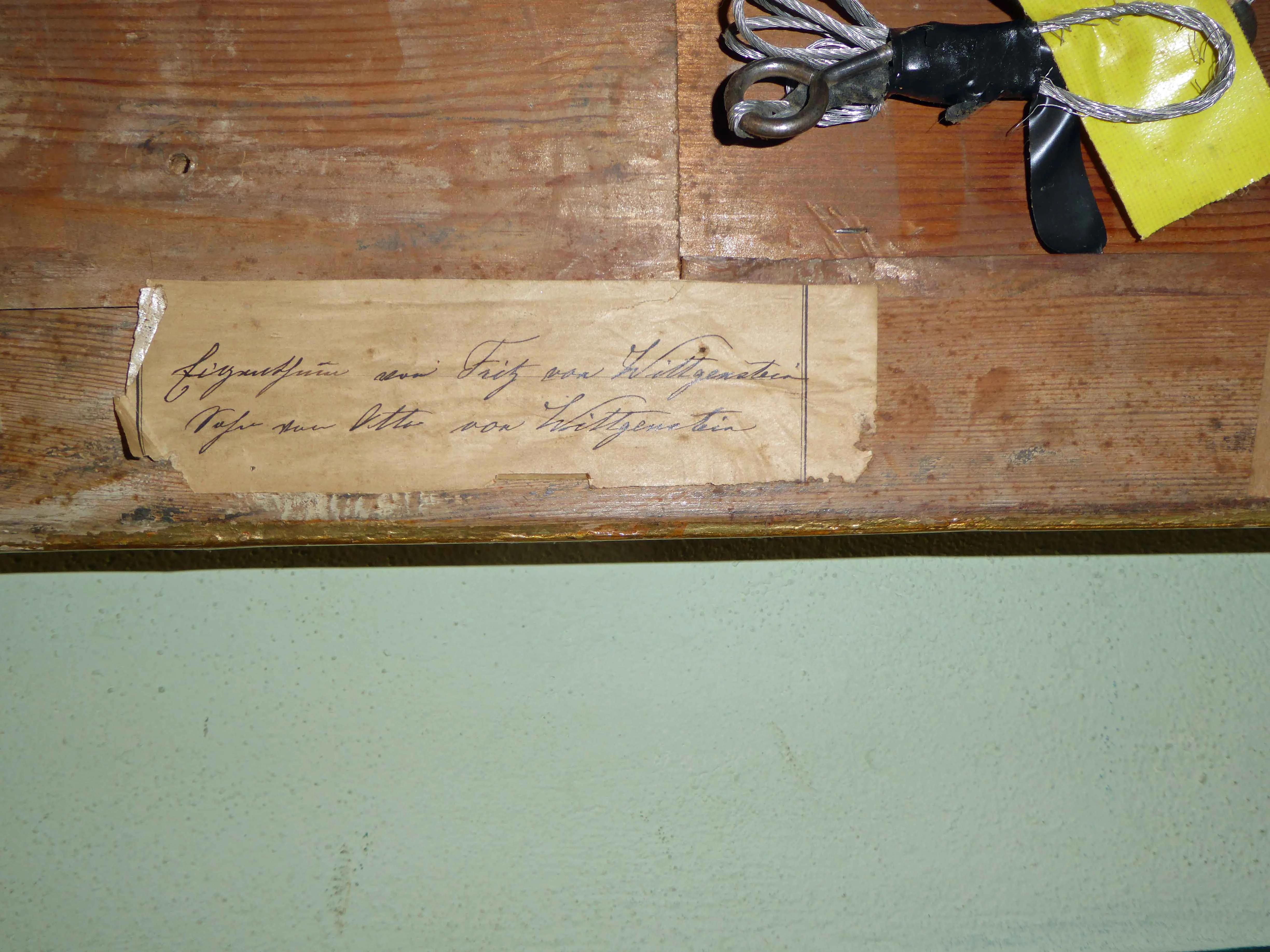 Zettel hinten "Wittgenstein"